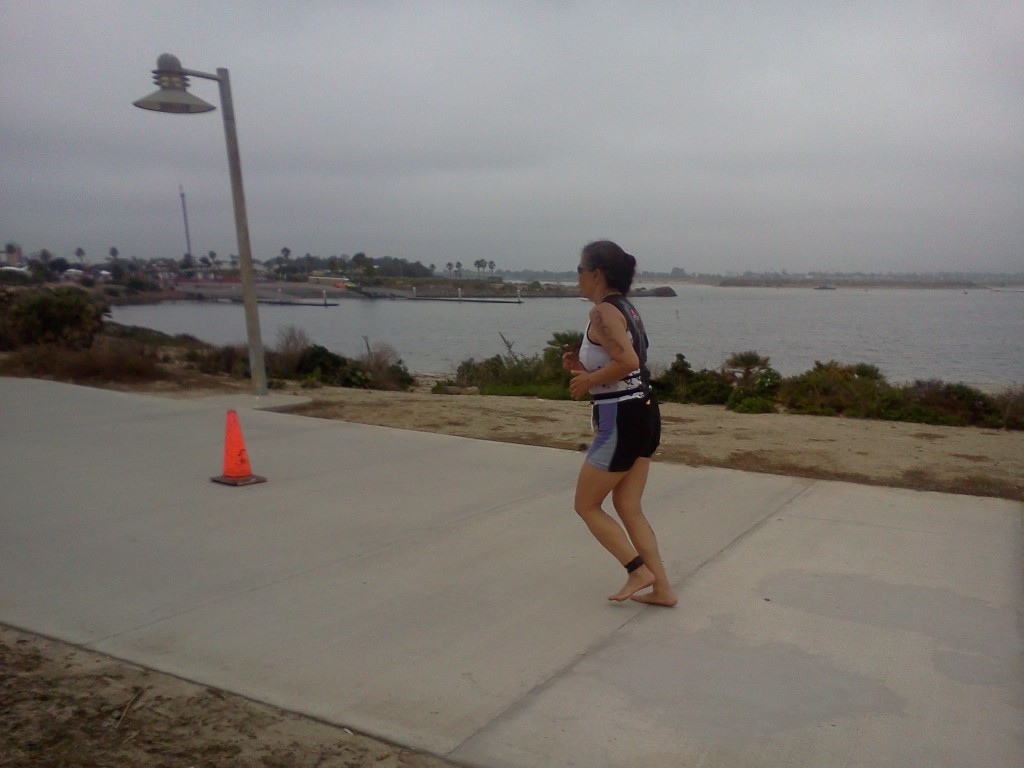 Cathy Lee-Saxton running barefoot at She-Rox Triathlon 2011 October 15 San Diego CA