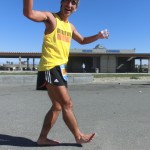 Dennis pretending to heel-strike barefoot (2012 February 5) Surf City Marathon