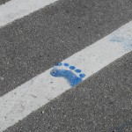 Footprint on the road – International Barefoot Running Day (2011 May 1) Huntington Beach CA