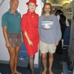 Todd and Ken Bob mugging with a flight attendant