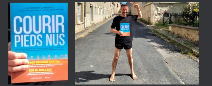 Sylvain Griot (translator) standing barefoot on street, holding copy of the book Barefoot Running Step by Step translated to French