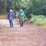 Adreah & Cheryl Walking Up the Path